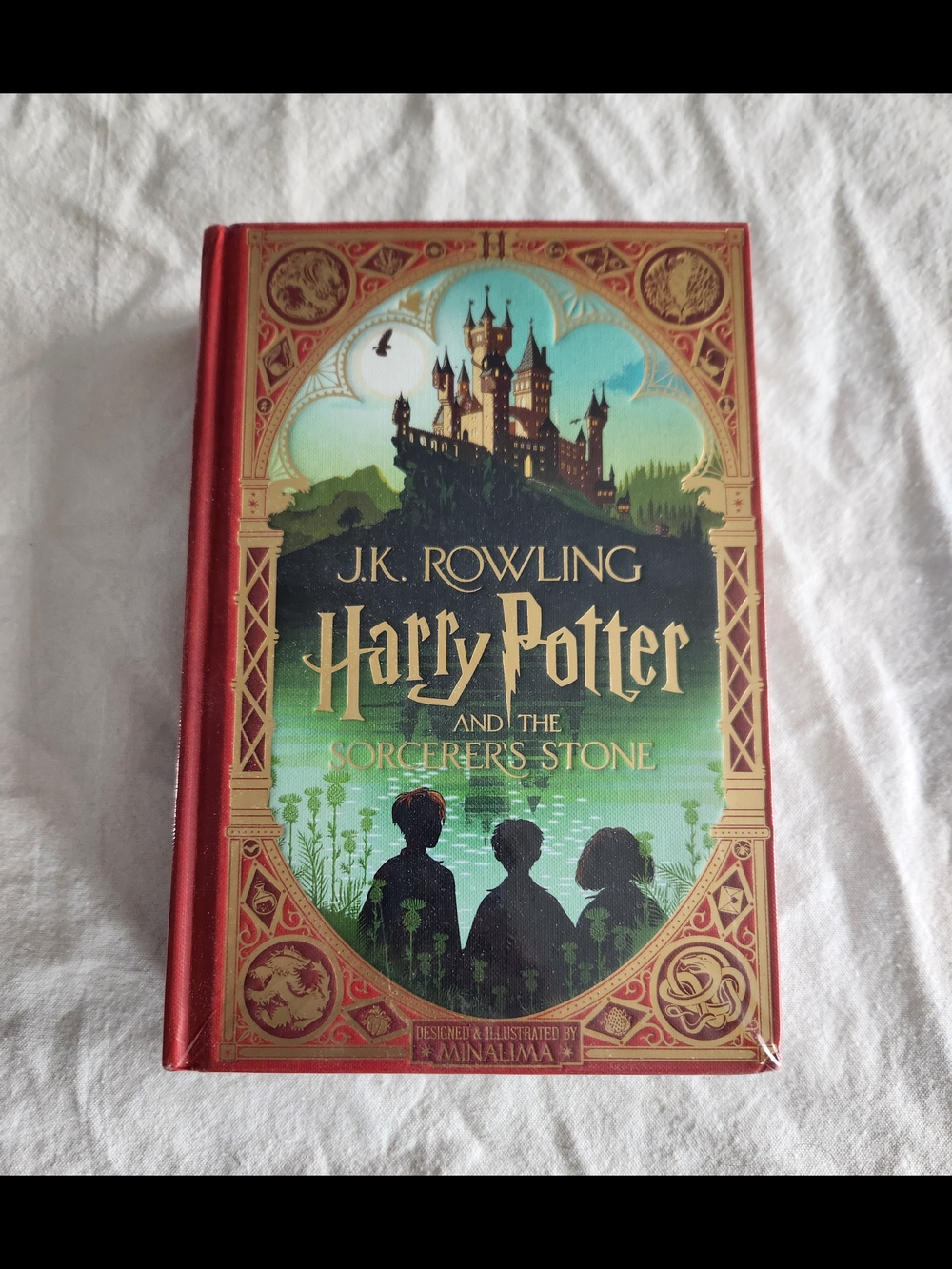 J.K. Rowling Harry Potter and the Sorcerer's Stone Hardcover — Red & Green Cover